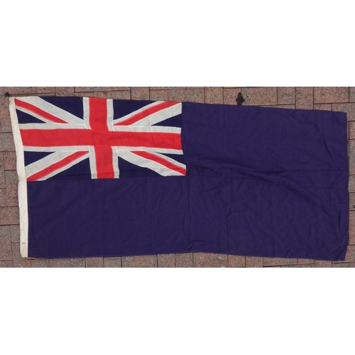 411 - A vintage Red Ensign, 100 x 200cm, a Blue Ensign, 85 x 180cm, a Union Flag, 125 x 265 and three mode... 