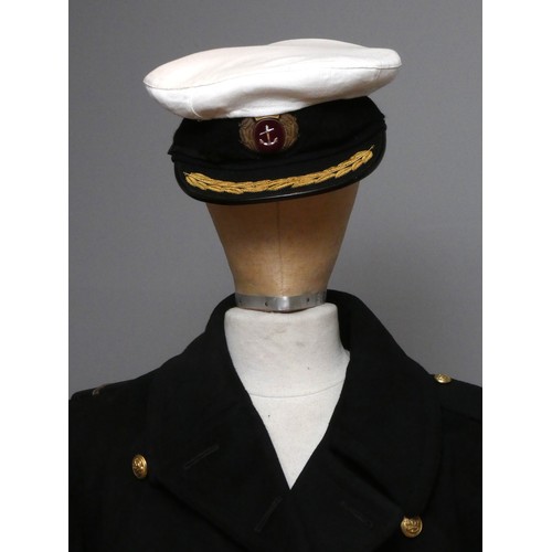 420 - A Mercantile Marine officers overcoat, with cap, braid and spare buttons, 48cm across the shoulders