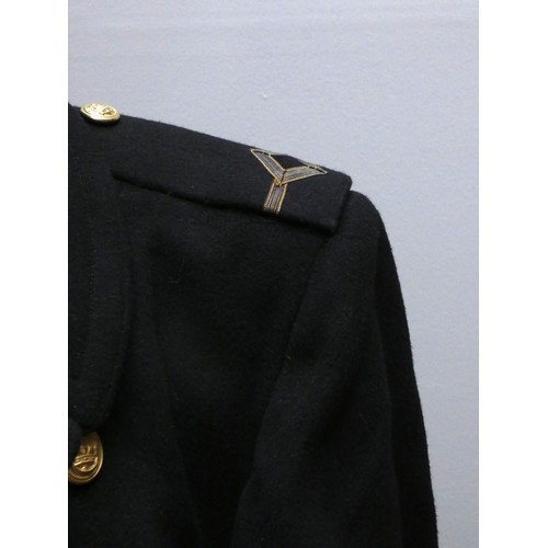 420 - A Mercantile Marine officers overcoat, with cap, braid and spare buttons, 48cm across the shoulders