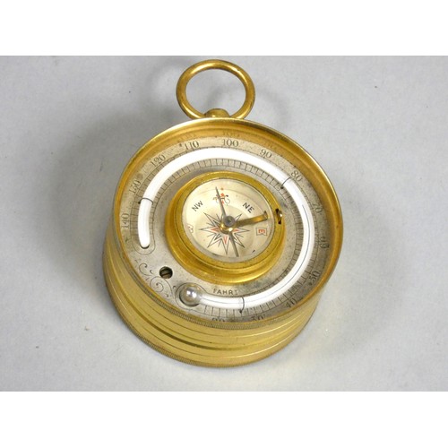 389 - A brass compensated pocket barometer, the reverse with thermometer and compass, unsigned, double ope... 