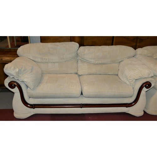 156 - A three piece suite comprising of a three seater sofa and two armchairs, upholstered in a cream patt... 