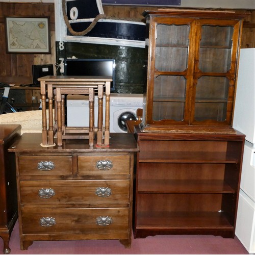159 - A mid 20th Century oak chest of drawers, together with an oak nest of three tables, a freestanding o... 