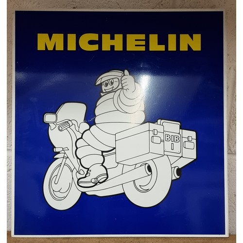 90 - A Michelin Man double sided metal wall mounted motorcycling advertising sign, 47 x 47cm