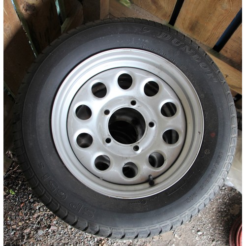 134 - A set of Four Suzuki Jimny steel wheels, shod with Dunlop SP65is 195/65/R15 tyres