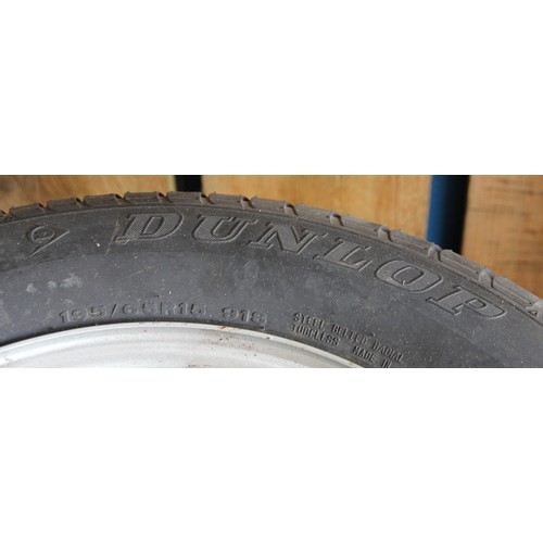 134 - A set of Four Suzuki Jimny steel wheels, shod with Dunlop SP65is 195/65/R15 tyres