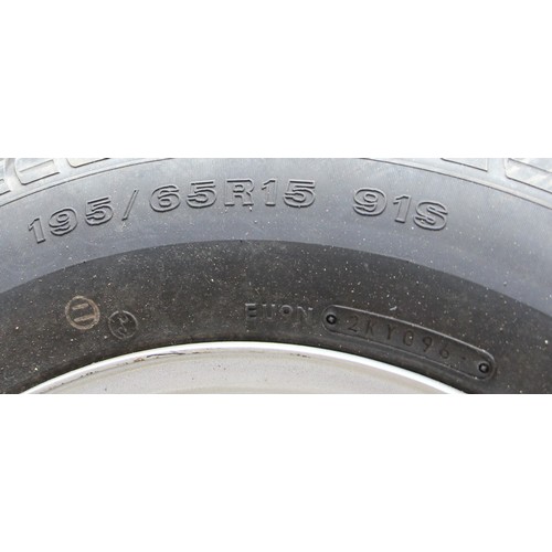 134 - A set of Four Suzuki Jimny steel wheels, shod with Dunlop SP65is 195/65/R15 tyres