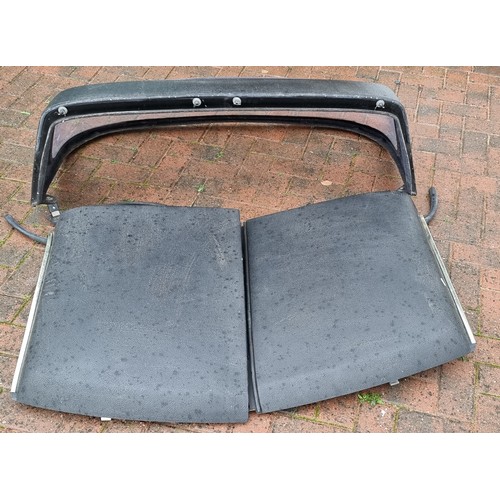 146 - An MGB fibreglass targa top hard top, with removeable central sections.