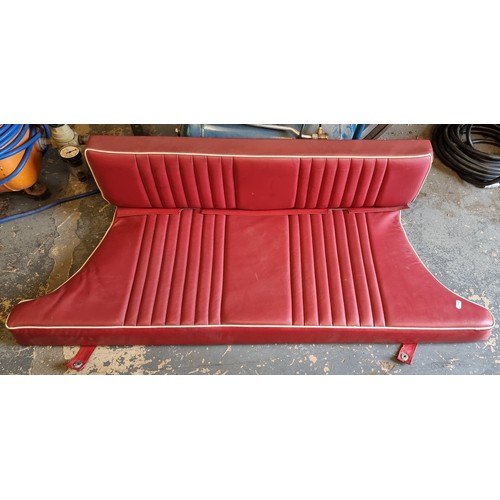 148 - An MGB GT rear two piece seat in red vinyl with white piping