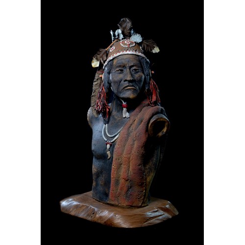 83 - Brian Tozer (b.1944). Thunder, Apache warrior, stoneware clay, leather, signed and dated 99, mounted... 