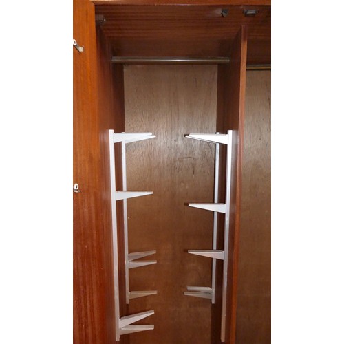 283 - A G-Plan teak wardrobe, 90cm x 59cm x 175cm, a G-Plan chest of six short drawers, 56cm x 45cm x 103c... 