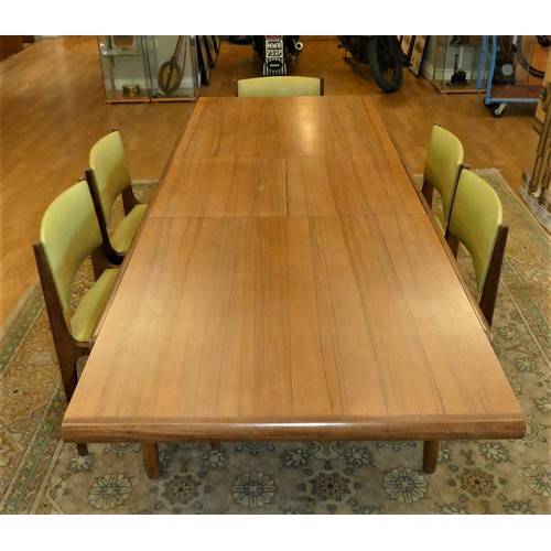 270 - A 1960s Danish teak extending dining table raised to tapered legs, height 75cm, length 180cm, (close...