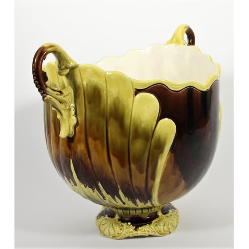 A late 19th continental two handled jardinière on stand, decorated