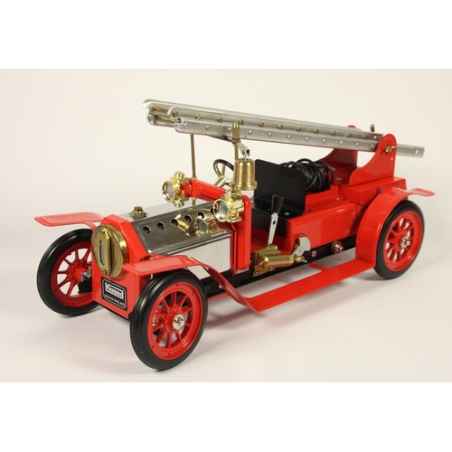 150 - A Mamod live steam 1404 Fire Engine FE1, depicting an Edwardian machine, 490 x 185 x 250mm, original... 