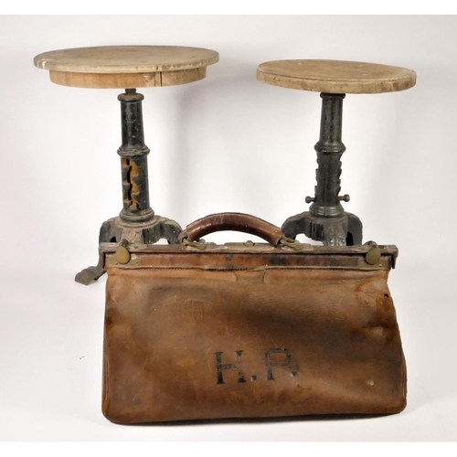 178 - A Victorian/Edwardian leather Gladstone bag initialled H.R. together with, two cast iron machinist s...