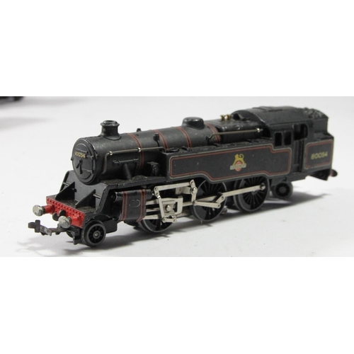 2 - A Hornby 'OO' gauge locomotive 2-6-4 tank engine (80054) with tender and loose track together with, ... 