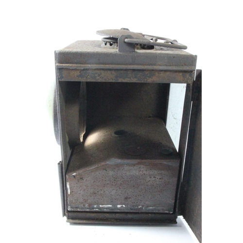 249 - A square unmarked railway lamp, without burner.