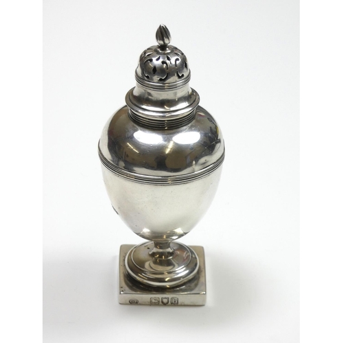 65 - A Victorian silver pepper pot, by George Fox, London 1897, of vase form, raised on a square base, 76... 