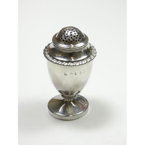 65 - A Victorian silver pepper pot, by George Fox, London 1897, of vase form, raised on a square base, 76... 