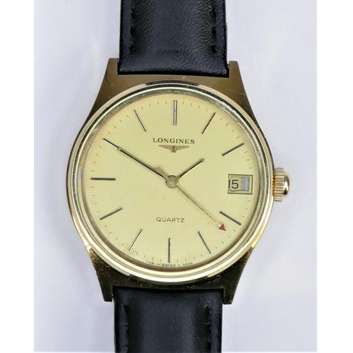 84 - Longines, a gold plated quartz date gentleman's wristwatch, with red seconds hand, 33mm