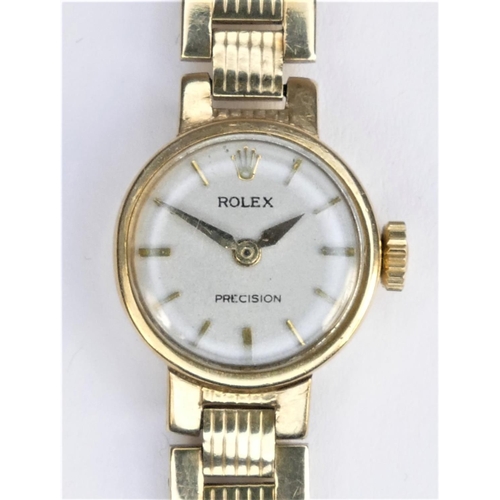 100 - Rolex Precision, a 9ct gold manual wind ladies wristwatch, London 1958, the silvered dial with baton... 