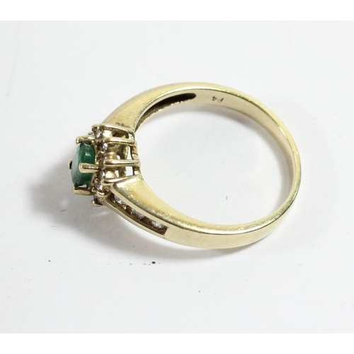 110 - A 10k gold emerald and brilliant cut diamond cluster ring, O 1/2, 3gm