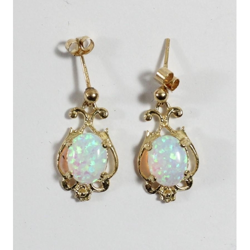 111 - A pair of 9ct and opal earrings, opal 9 x 7mm, 2gm