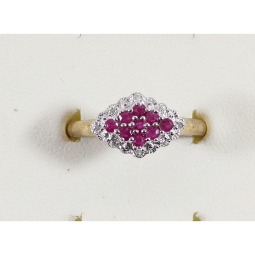 113 - A 9ct gold ruby and diamond dress ring, R, 2.5gm