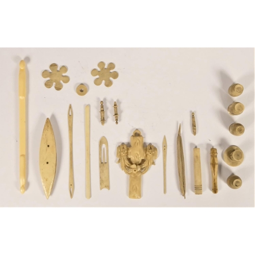 196 - A collection of 19th century ivory and bone sewing tools, to include a tatting shuttle and thread ba... 