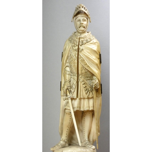 213 - A 19th century Dieppe ivory carved triptych figure of a French medieval nobleman with sword, his che... 