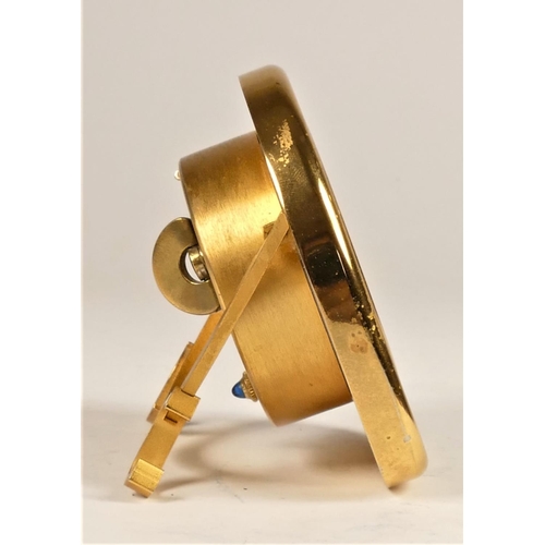 316 - Cartier, Paris, a brass and green enamel 7504 travel alarm clock, c.1990, the white enamel dial with... 