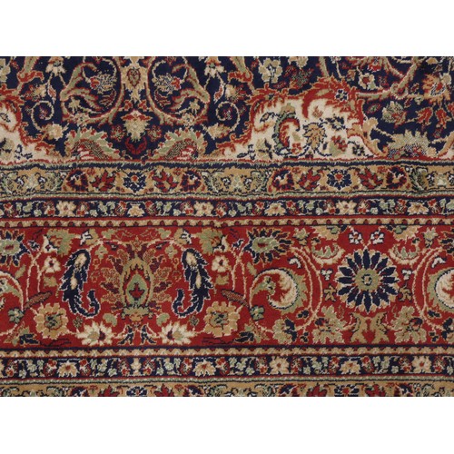 217 - A Shiraz part silk rug, with central floral pendant medallion and spandrels, flowers and trees on a ... 