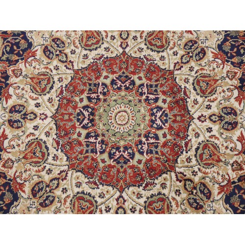 217 - A Shiraz part silk rug, with central floral pendant medallion and spandrels, flowers and trees on a ... 