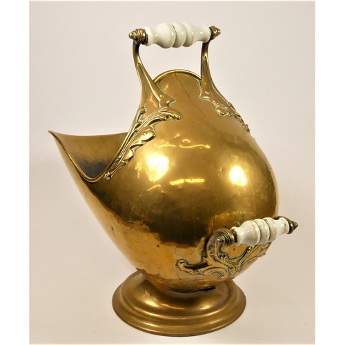 208 - A Victorian brass helmet coal scuttle, with two opaline glass handles and applied floral scrolls, 50... 