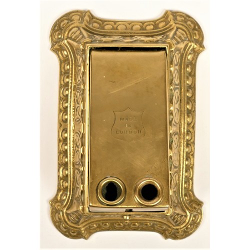 210 - A cast brass cigar cutter, with two cut ting holes, stamped Made in England, 13.5 x 9 x 7cm