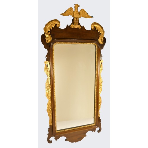 206 - An Edwardian mahogany and gilt wood wall mirror, with eagle surmount and floral border, 105 x 49cm