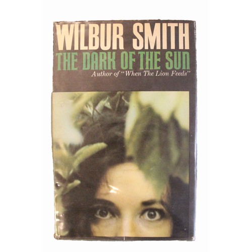 160 - Wilbur Smith. When The Lion Feeds. William Heinemann. 1st edition 1964. Dust wrapper. Signed by auth... 