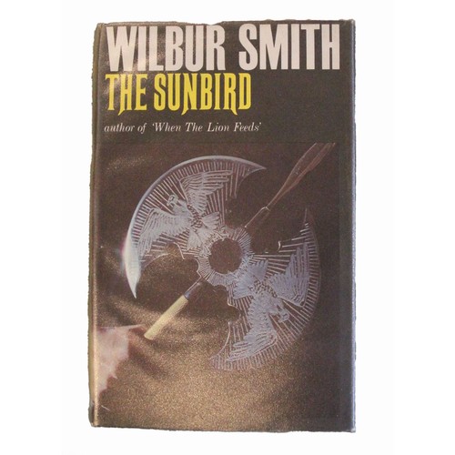 160 - Wilbur Smith. When The Lion Feeds. William Heinemann. 1st edition 1964. Dust wrapper. Signed by auth... 