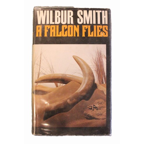 160 - Wilbur Smith. When The Lion Feeds. William Heinemann. 1st edition 1964. Dust wrapper. Signed by auth... 