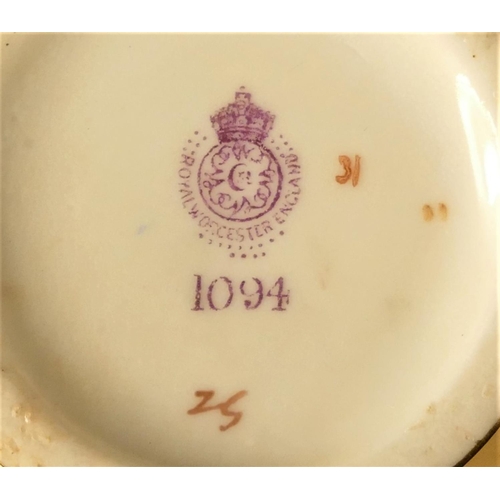 17 - A Royal Worcester blush ivory cream jug, decorated with the 1094 floral spray pattern, flattened end... 