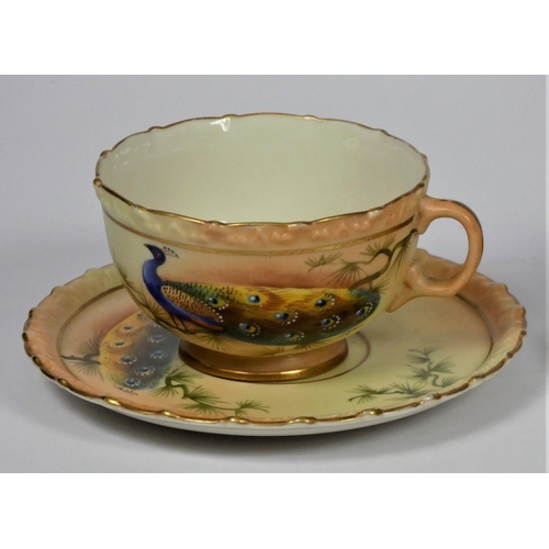 29 - A pair of Locke & Co, Worcester cups and saucers, decorated with peacocks by J. Lewis, pattern 361.