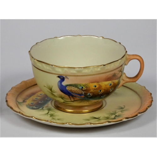 29 - A pair of Locke & Co, Worcester cups and saucers, decorated with peacocks by J. Lewis, pattern 361.