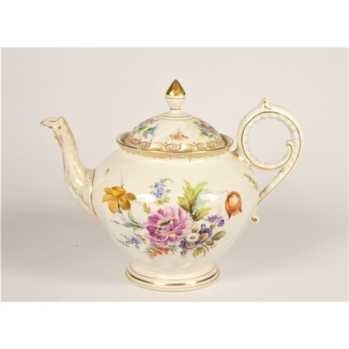 40 - A Dresden half fluted tea pot, under glaze T over X mark, red 825, the body decorated with floral sp... 