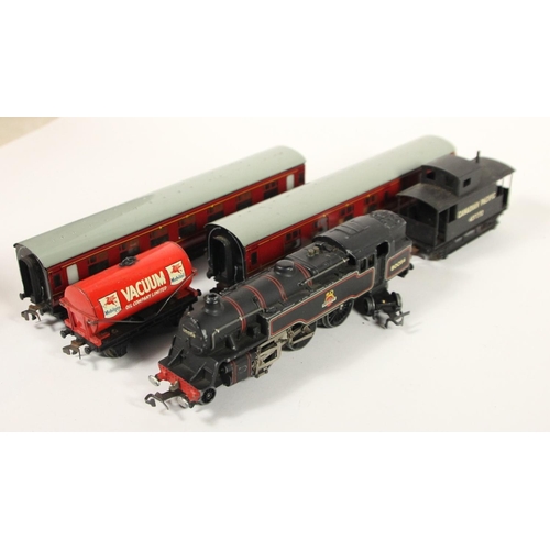 72 - A Hornby Dublo OO gauge 3-rail B.R. black standard tank 80054 together with passenger coaches and te... 