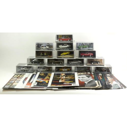 89 - A collection of sixteen James Bond Die-cast vehicles, 1/43 scale, original packaging, attached to th... 