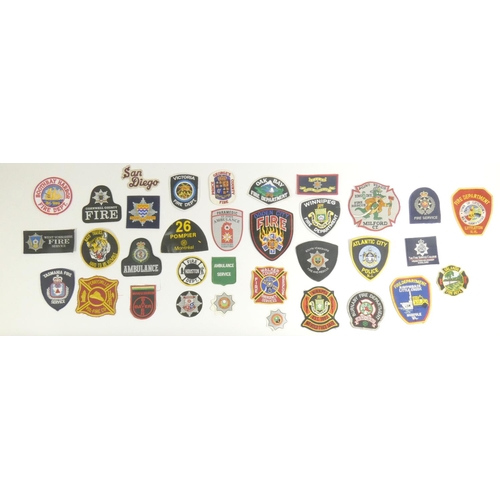 99 - A collection of thirty one Emergency Service patches, consisting mainly of American Fire Departments