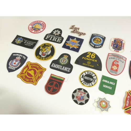 99 - A collection of thirty one Emergency Service patches, consisting mainly of American Fire Departments