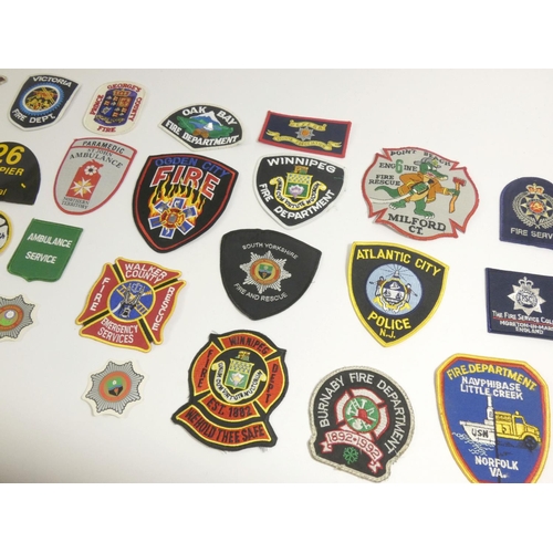 99 - A collection of thirty one Emergency Service patches, consisting mainly of American Fire Departments