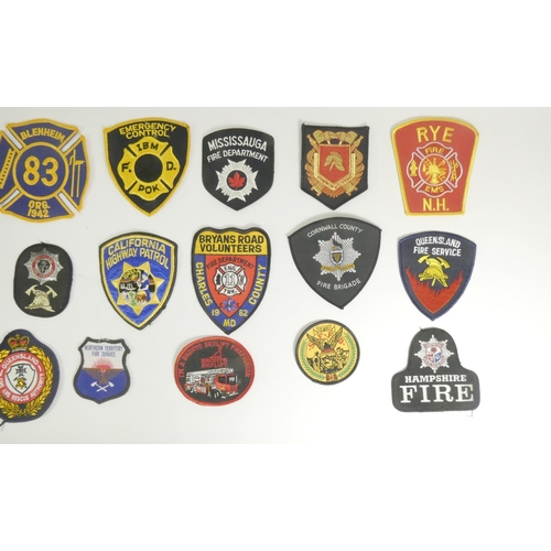 103 - A collection of thirty one Emergency Service patches, consisting mainly of American Fire Departments