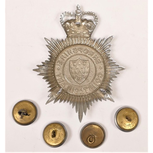 105 - A Shropshire Constabulary helmet badge, Queen's Crown, together with four matching buttons (5)