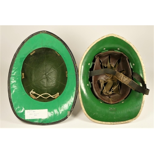 107 - A fireman's helmet, decorated with a horseshoe wreath with LFB lettering, size medium, together with... 